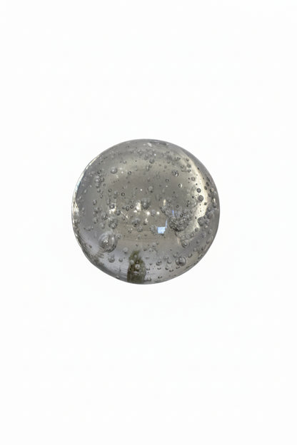 Vintage MCM controlled-bubble glass sphere, clear orb with scattered internal bubbles