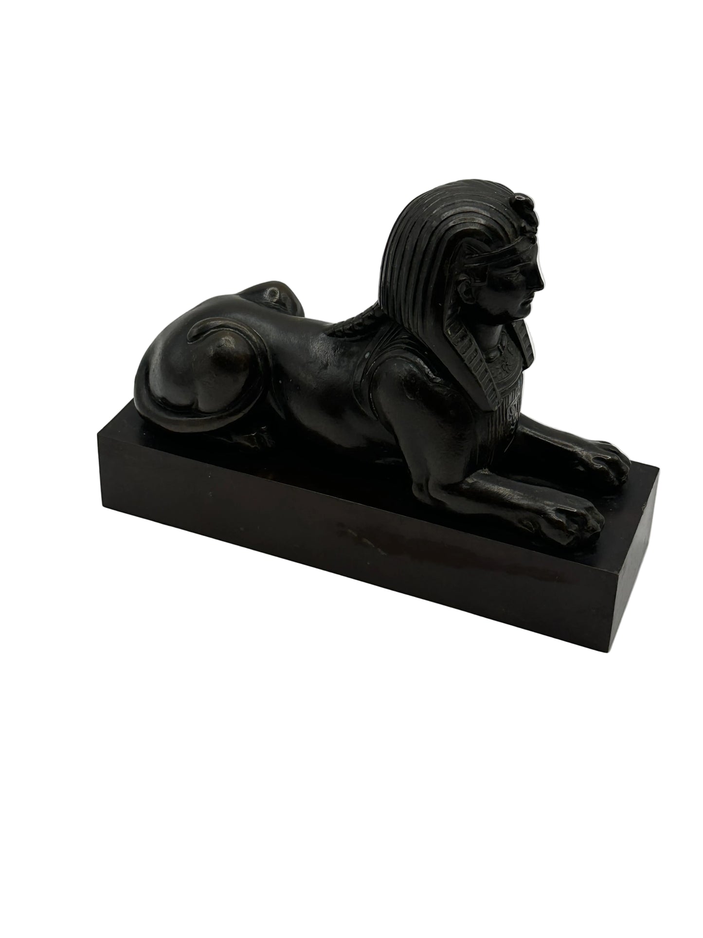 Vintage Egyptian Revival bronze sphinx, side profile showing nemes headdress and reclining body