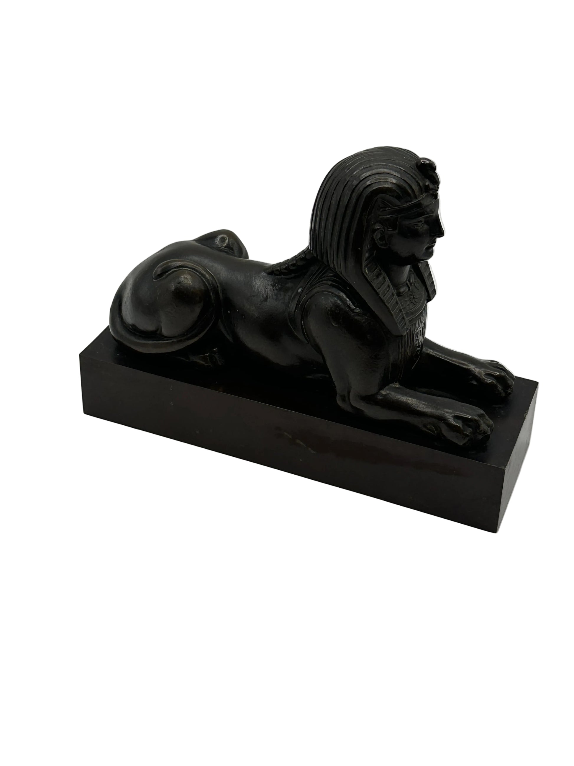 Vintage Egyptian Revival bronze sphinx, side profile showing nemes headdress and reclining body