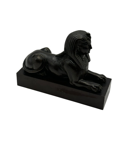 Vintage Egyptian Revival bronze sphinx, side profile showing nemes headdress and reclining body