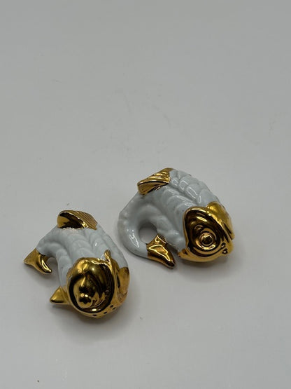 Vintage fish salt and pepper set, both gold-headed porcelain fish shown lying on their sides