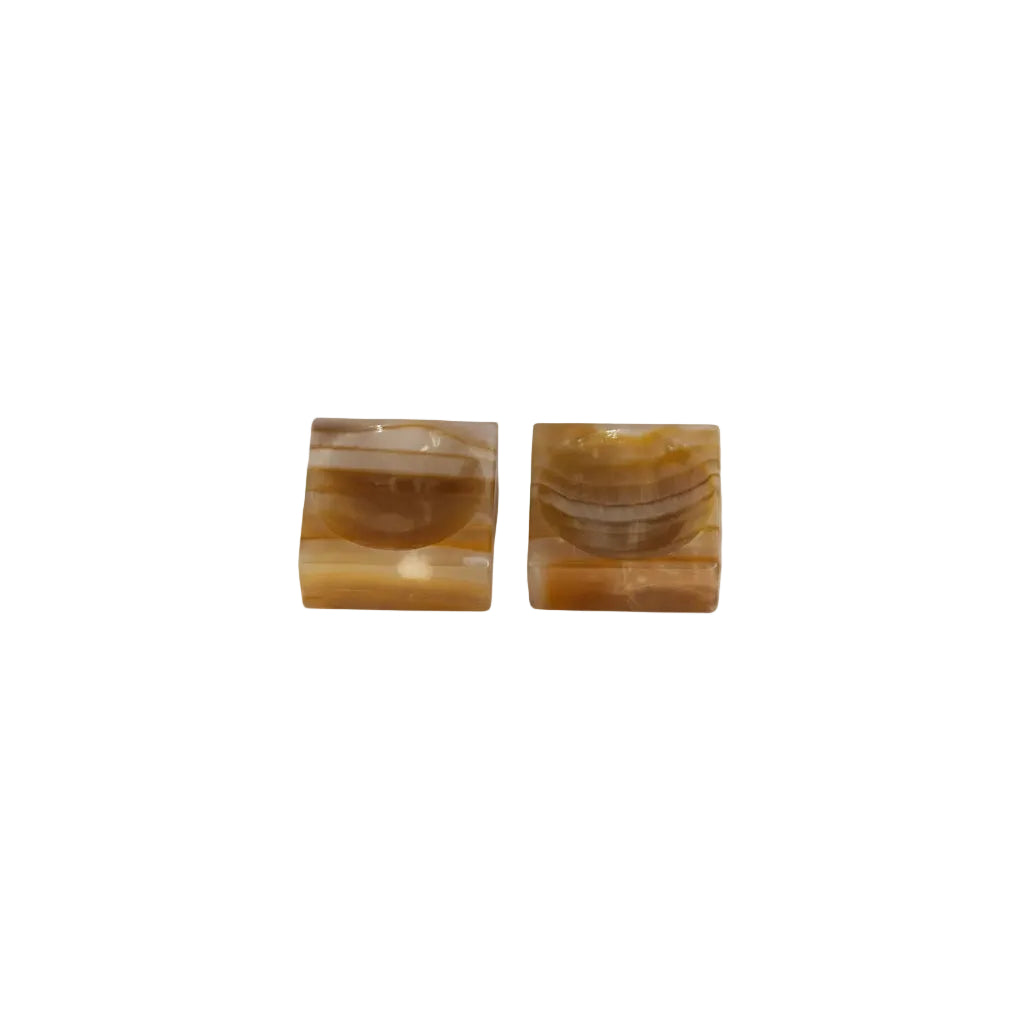 Vintage onyx salt cellars, pair shown front view in banded amber and cream stone