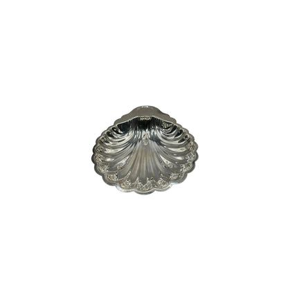 Vintage Rogers silver plate shell server, top view of scallop-form dish with fluted ribs and sauce niche