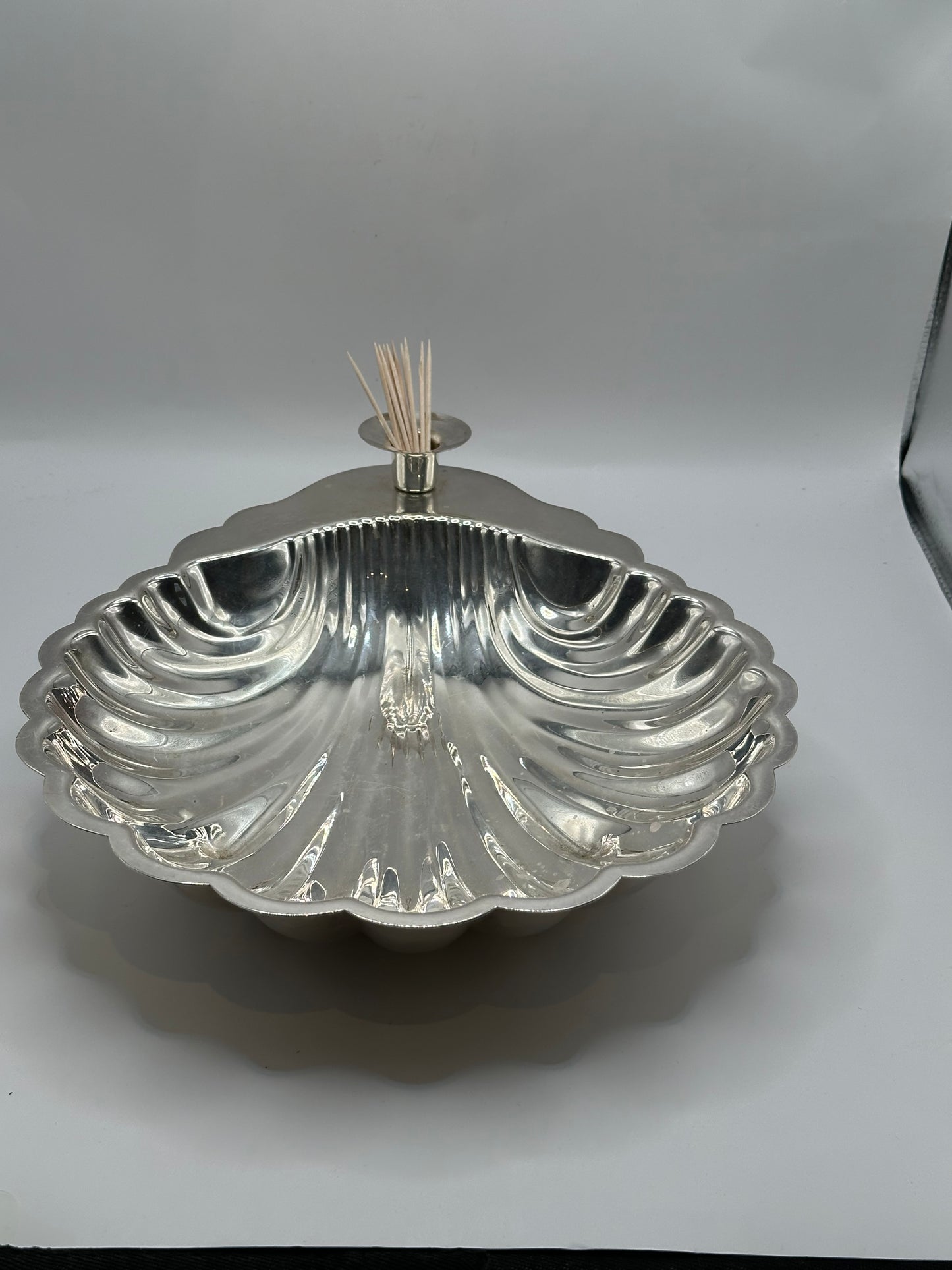 Sheridan silver plate shellfish server, angled front view with toothpicks in the center holder