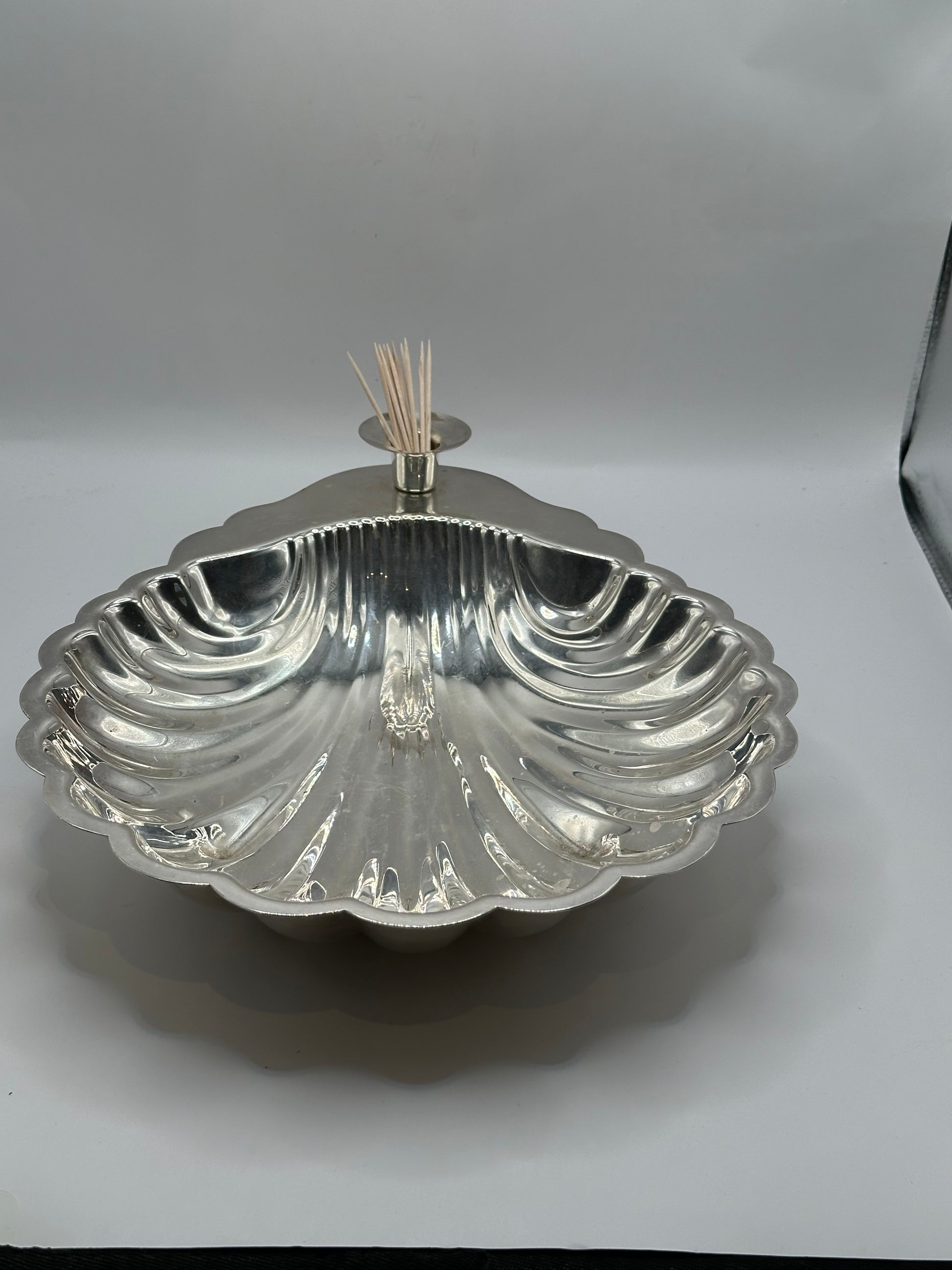 Sheridan silver plate shellfish server, angled front view with toothpicks in the center holder