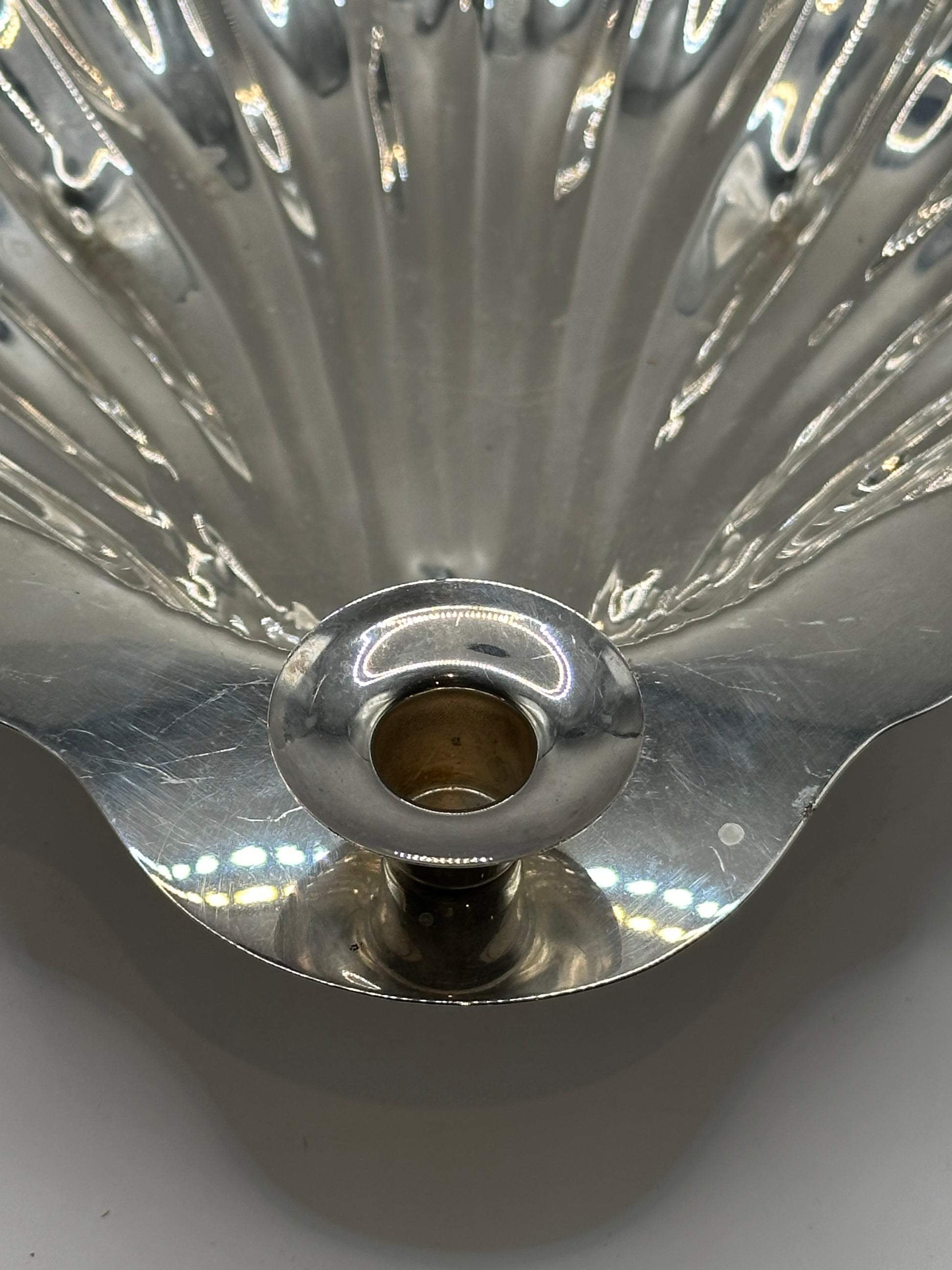 Close-up of the Sheridan server's central toothpick-holder socket, empty without glass insert