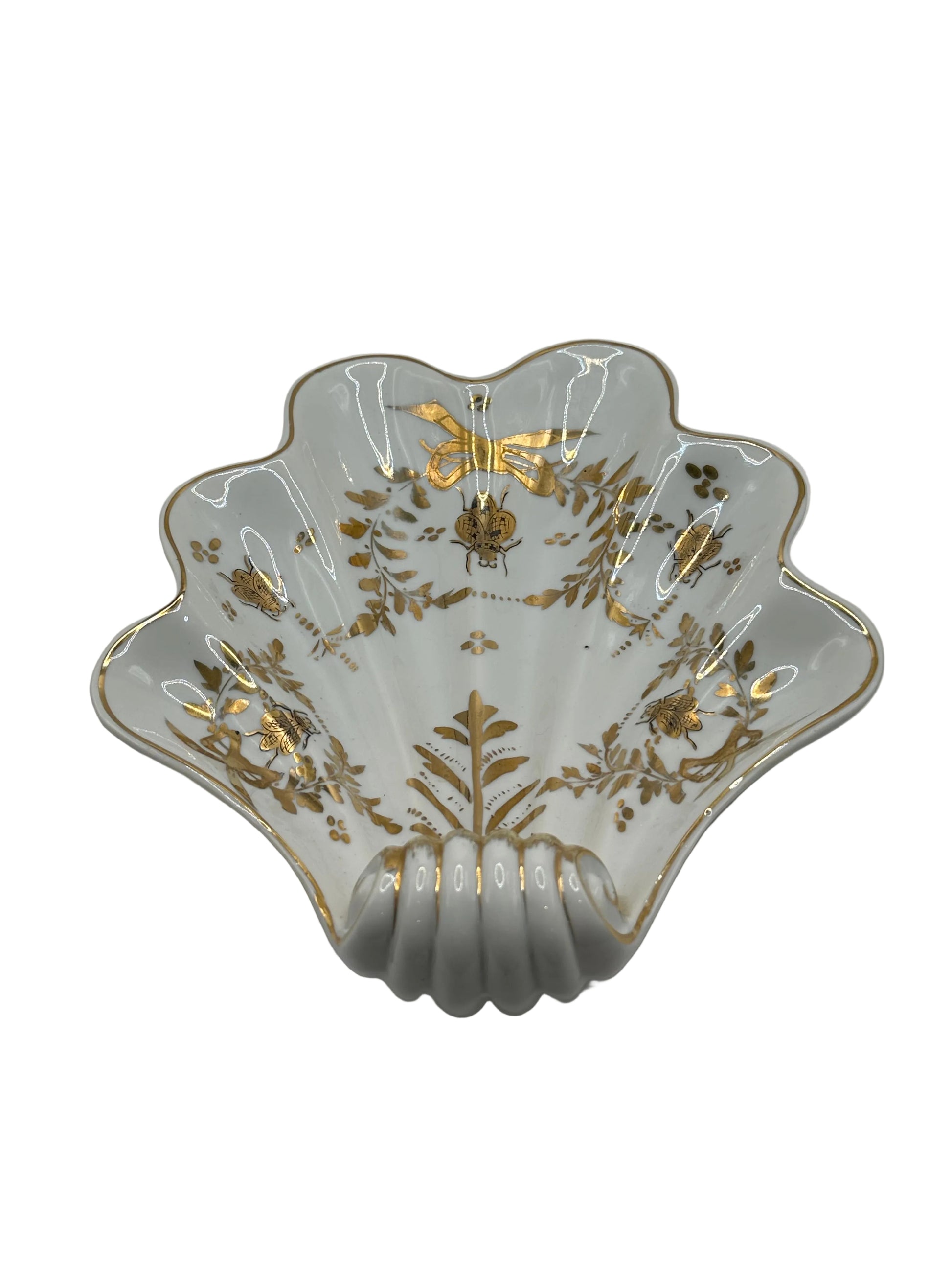 Vintage Limoges shell dish, angled view showing fluted shell base and gilt-decorated bowl