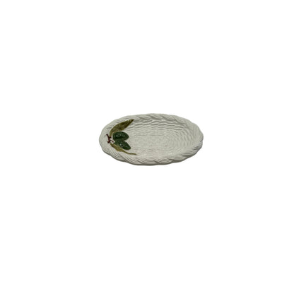 Italian ceramic olive dish, oval cream basketweave dish with raised green olive and leaf motif, top view