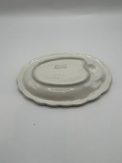 Italian ceramic olive dish underside with impressed Bassano Made in Italy maker's mark