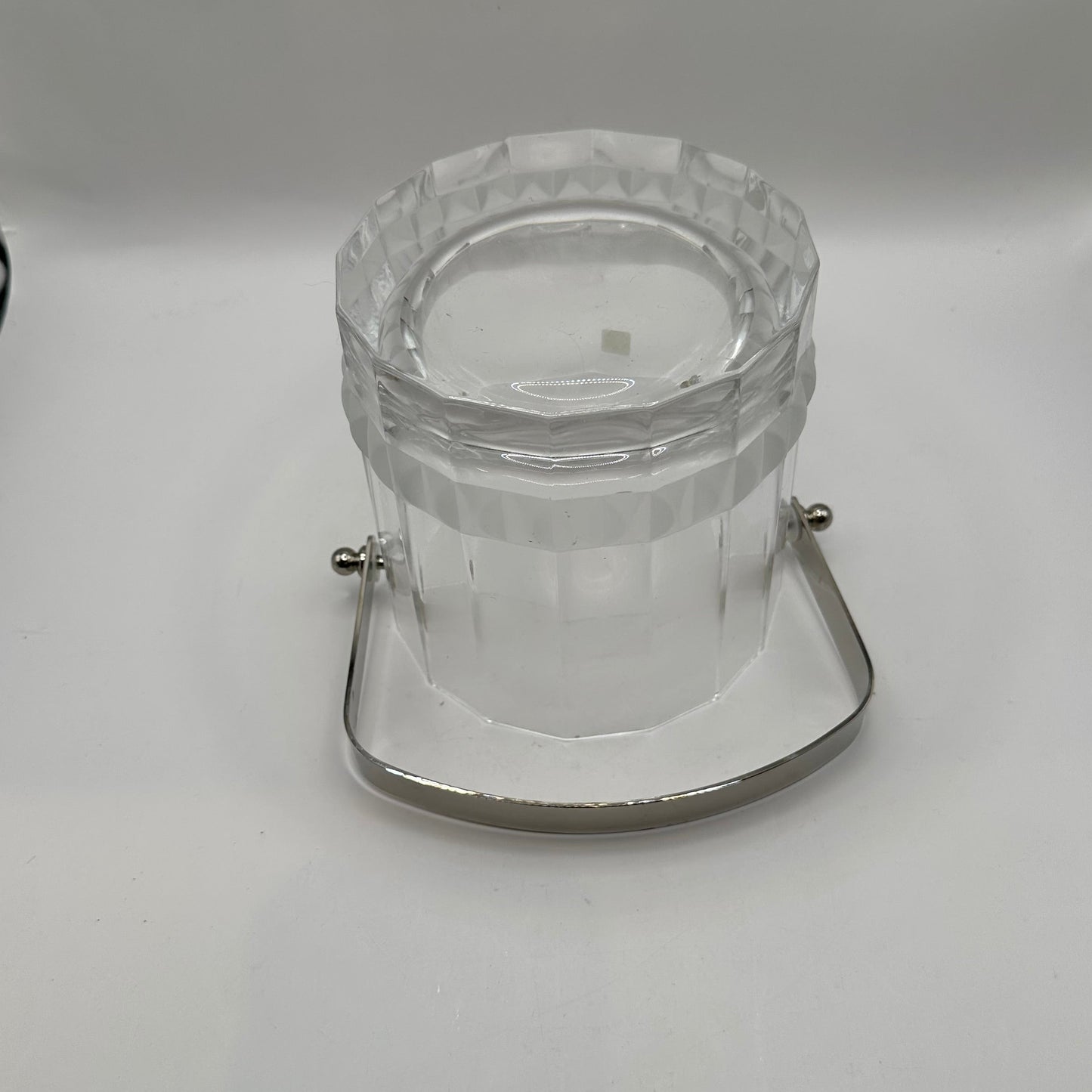 MCM crystal ice bucket, high angle showing the faceted rim and interior well