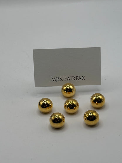 MCM brass spherical place card holders, six brass spheres clustered with a place card behind