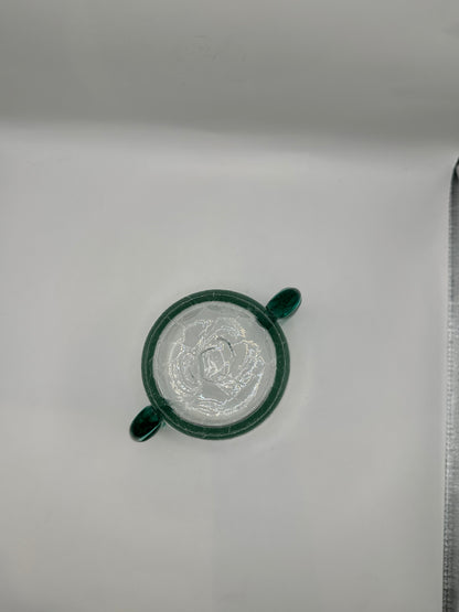 Detail of the MCM Blenko vase rim and applied teal glass handle from above