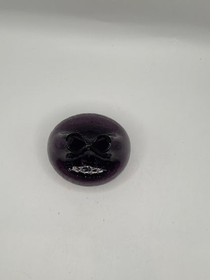 Overhead view of the amethyst Blenko vase showing the pinched folded opening