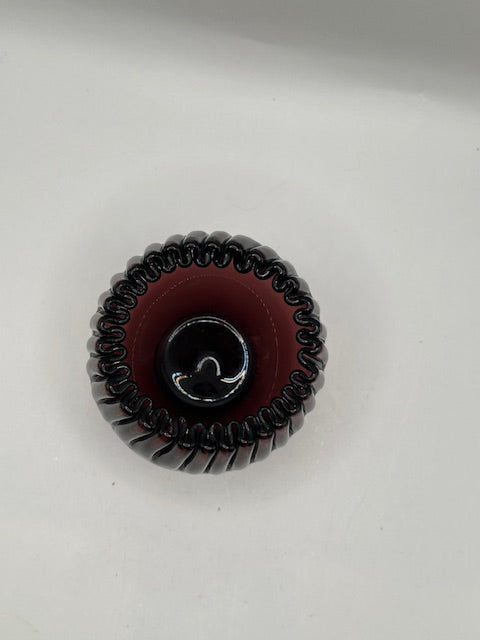 Top-down view of the amethyst crimped Blenko bowl showing fluted ruffled rim and pontil center