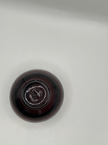 Underside of the amethyst Blenko crimped bowl showing the pontil mark