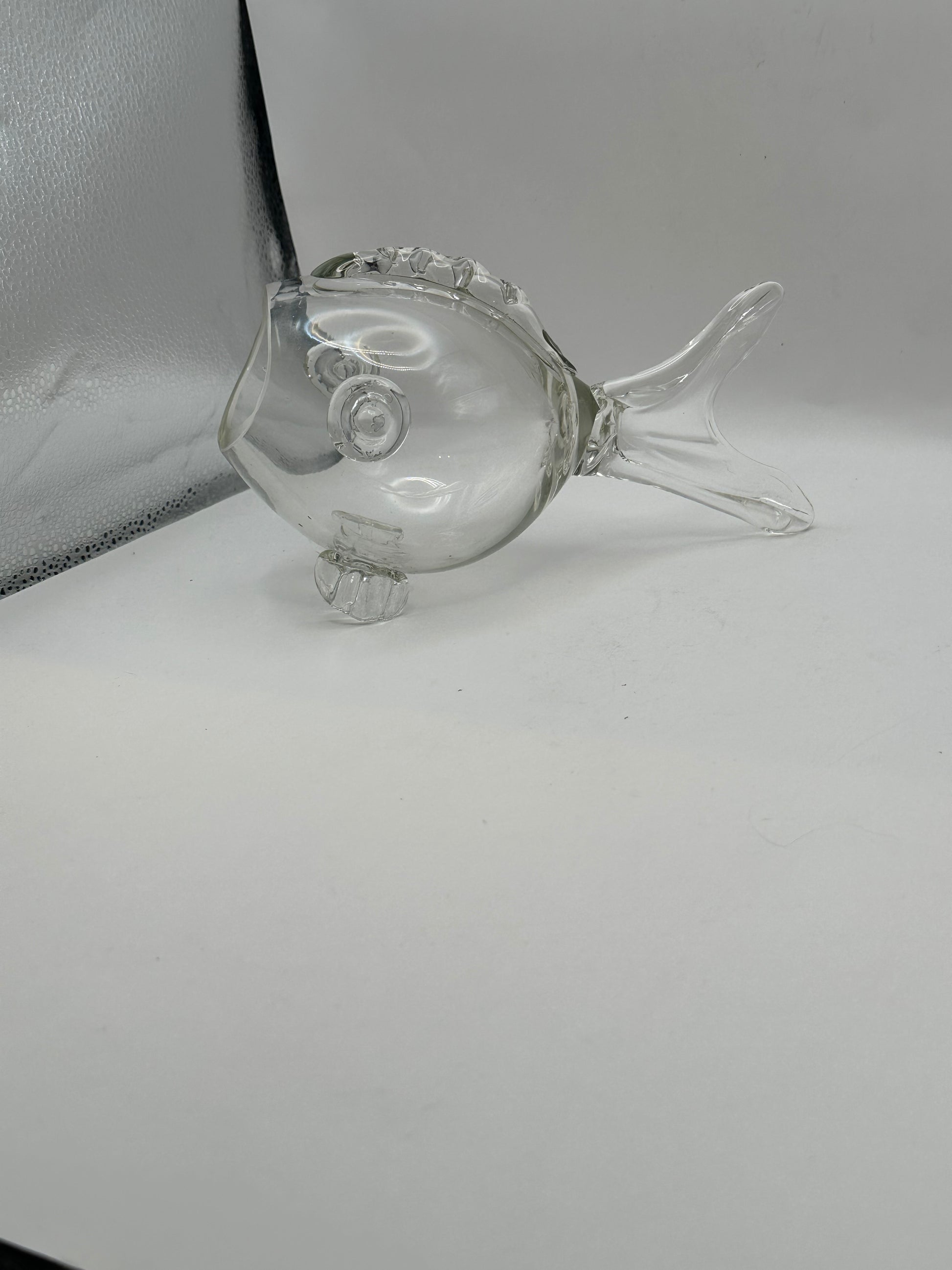 MCM Blenko clear glass fish vase resting on its side, full profile with tail and fins