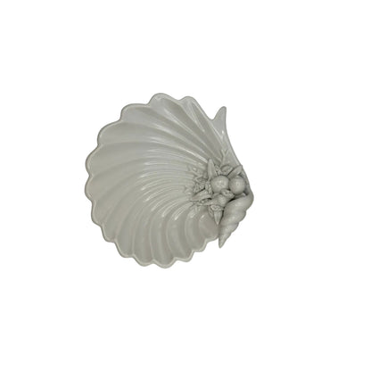 White porcelain shell dish with fluted scallop form and molded seashells at the hinge
