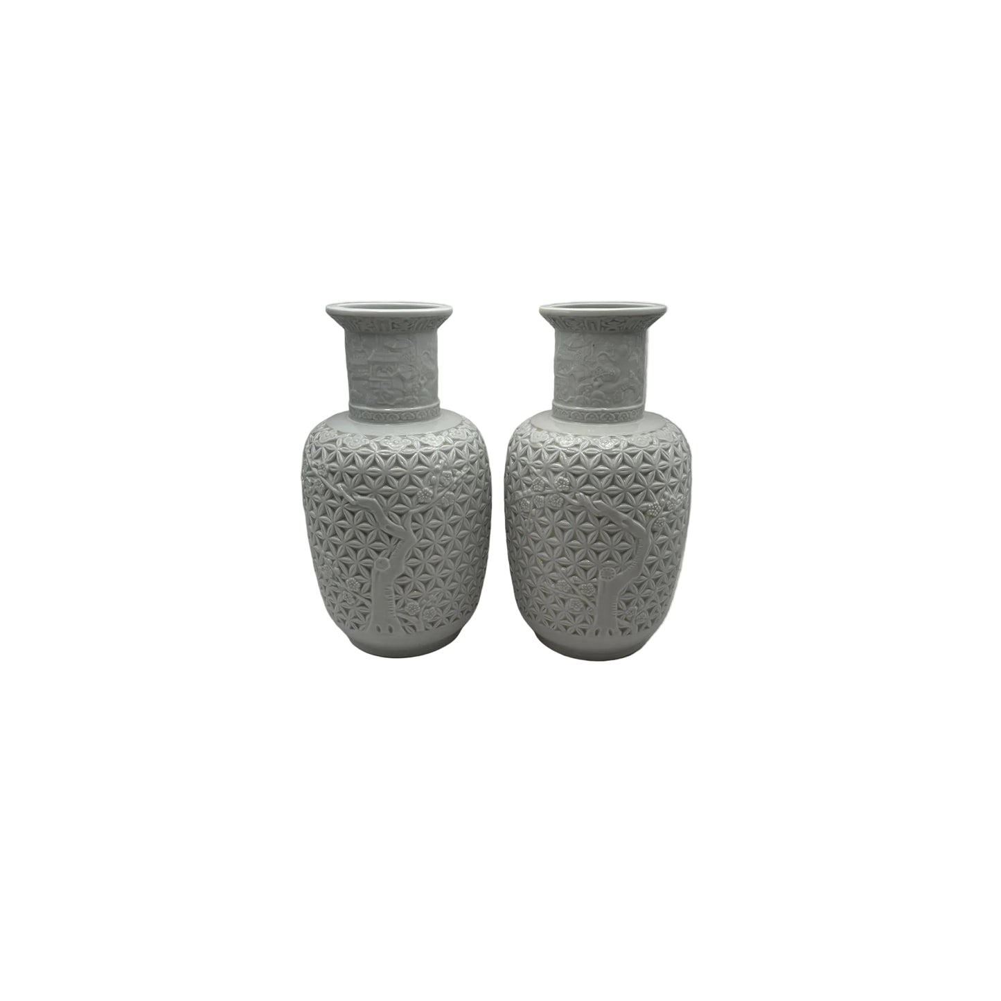 Pair of Blanc de Chine white porcelain baluster vases with lattice relief and prunus tree design, front view