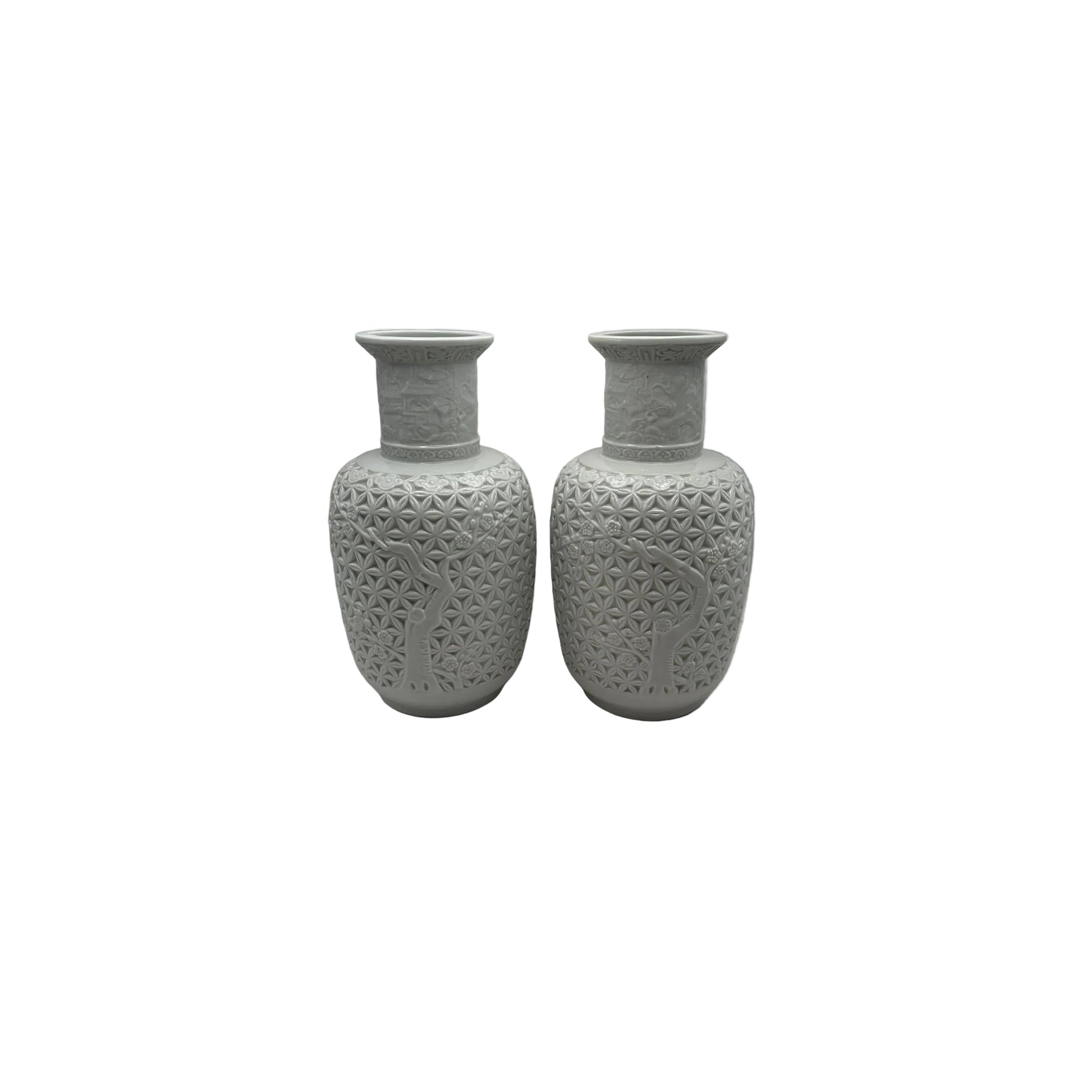 Pair of Blanc de Chine white porcelain baluster vases with lattice relief and prunus tree design, front view