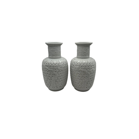 Pair of Blanc de Chine white porcelain baluster vases with lattice relief and prunus tree design, front view