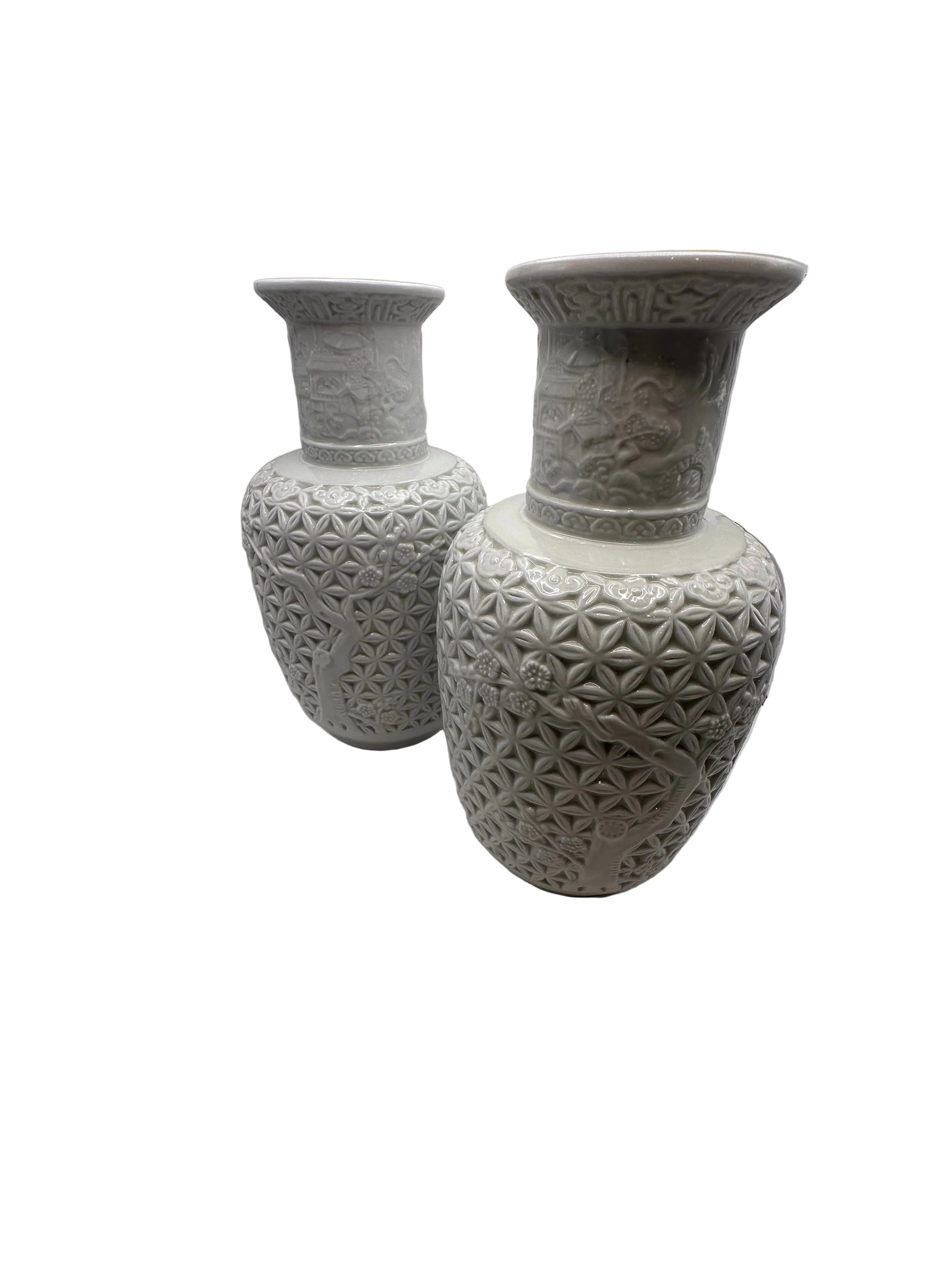 Pair of Blanc de Chine baluster vases shown front and back, angled view