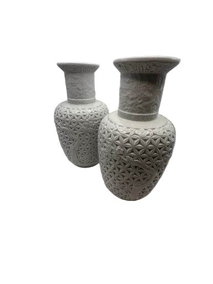 Pair of Blanc de Chine baluster vases shown front and back, angled view