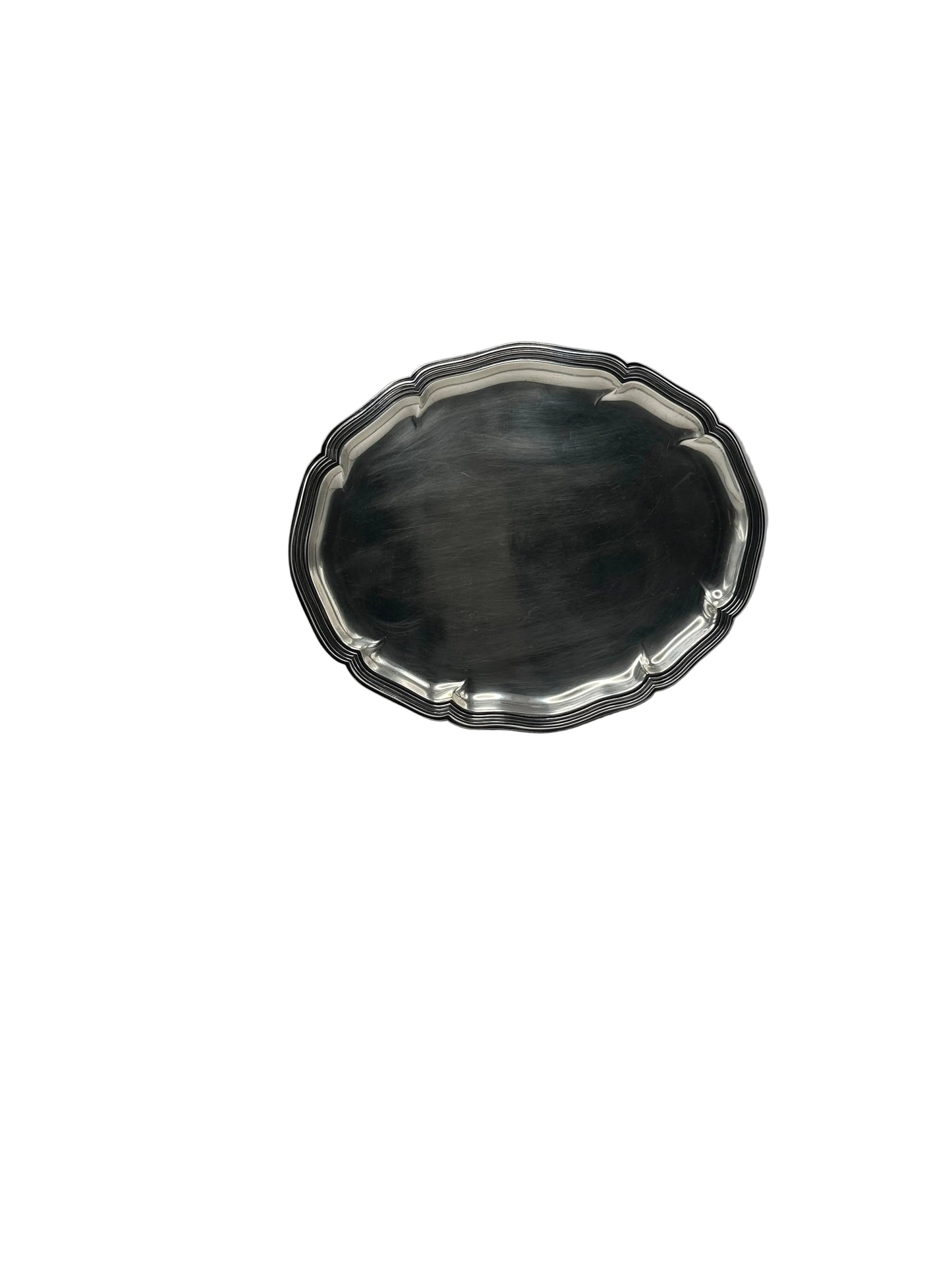 Oval silver-plate tray shown at an angle with darker reflection on its surface