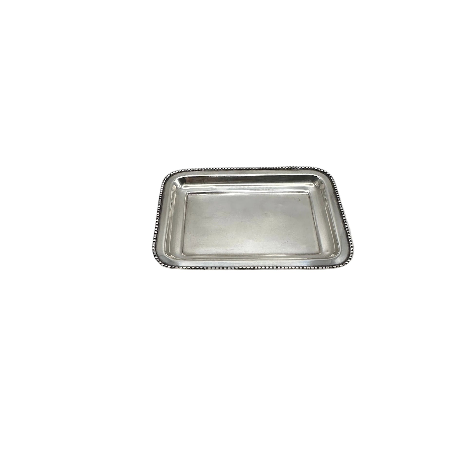 Small rectangular silver-plate tray with a beaded rim, angled view