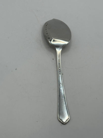Back of the aspic spoon showing the maker's mark on the handle
