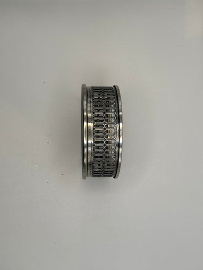 Side profile of the bottle coaster showing the pierced silver lattice gallery
