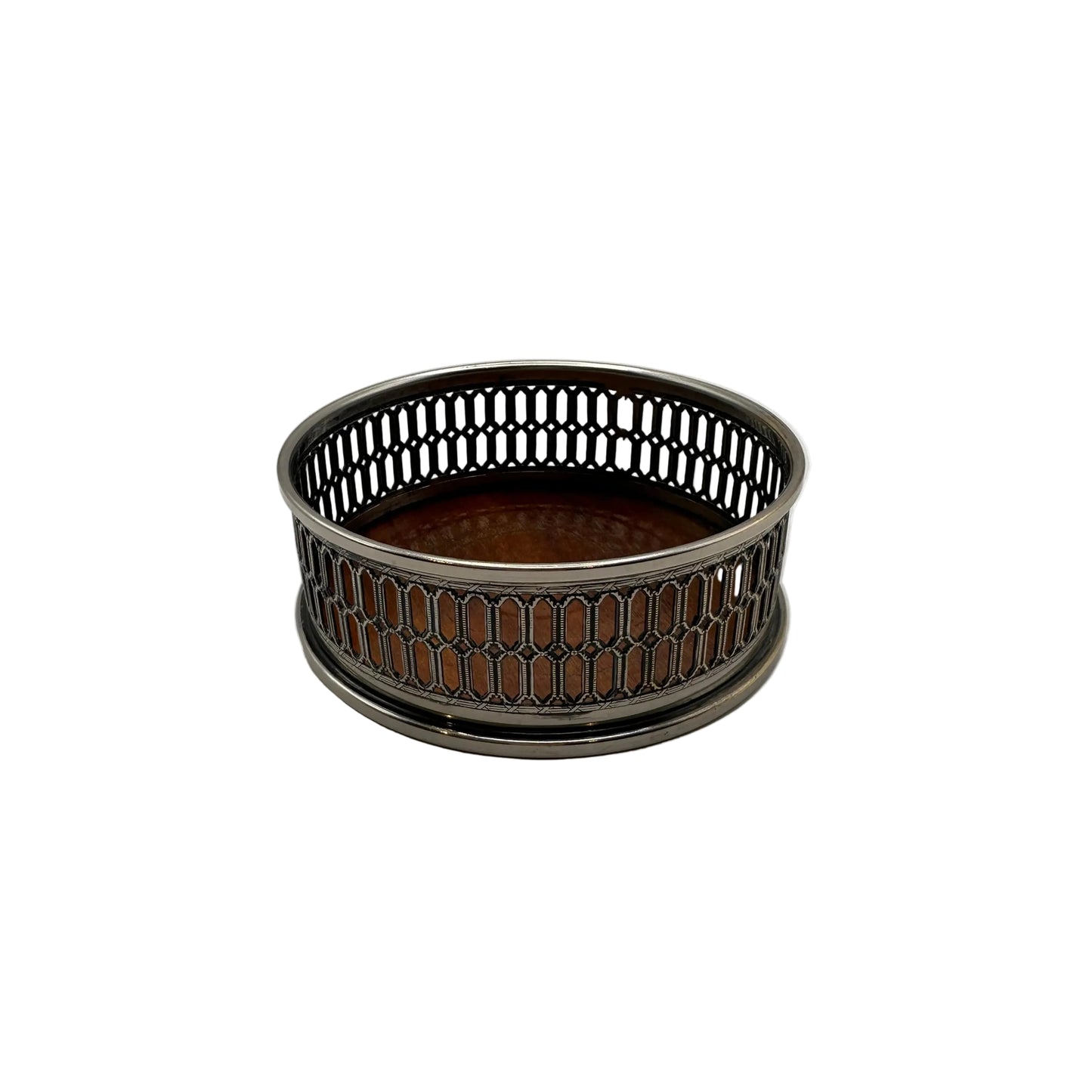 Silver-plate wine bottle coaster with a pierced lattice gallery and turned wood base, angled view