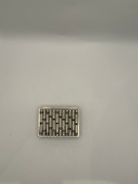 Top-down view of MCM silver plate box lid with vertical raised bamboo pattern