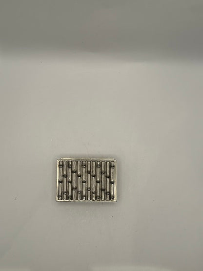 Top-down view of MCM silver plate box lid with vertical raised bamboo pattern