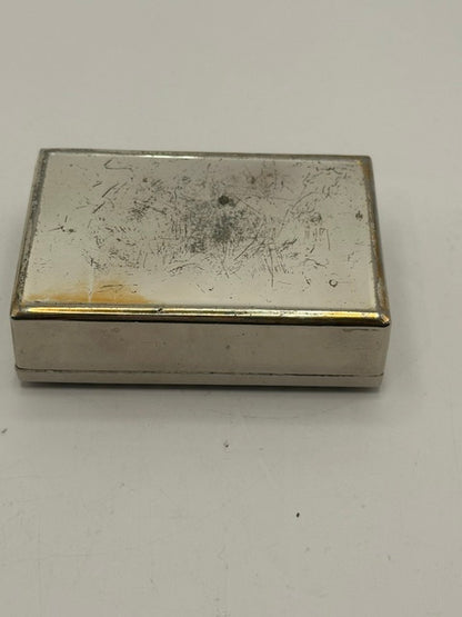 MCM silver plate box closed, side view of plain polished base and lid edge