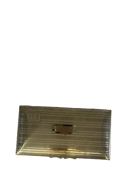 Top-down view of the cigarette box showing the thumb-tab and engraved cartouche