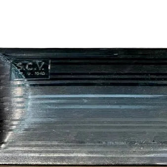Close-up of the box's engine-turned lined lid with the 'S.C.V.' cartouche