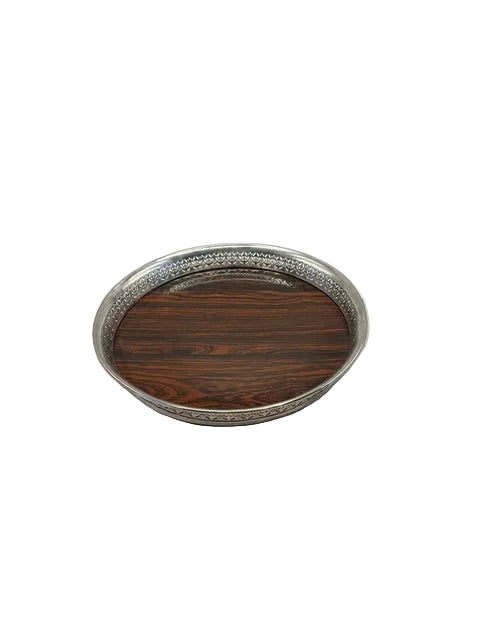 Angled view of the wood-and-silver gallery tray showing its raised pierced rim
