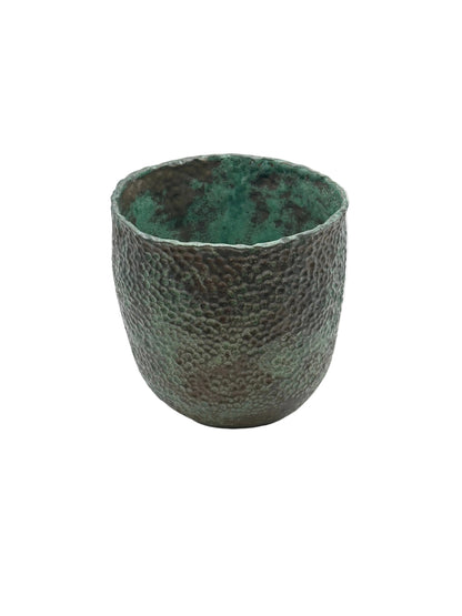 Wide-mouth green stoneware vessel with dimpled exterior and bright green glazed interior, front view