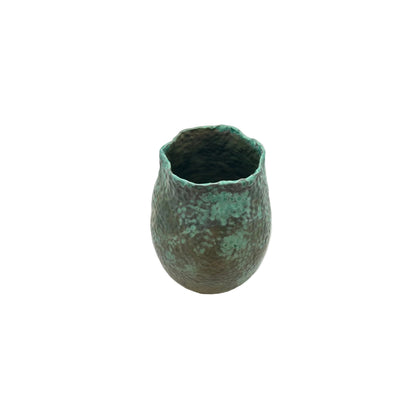 Medium rounded green stoneware vessel with dimpled texture and a rippled rim, front view