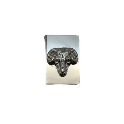 Silver-plate matchbox cover with embossed ram's head in relief, front view