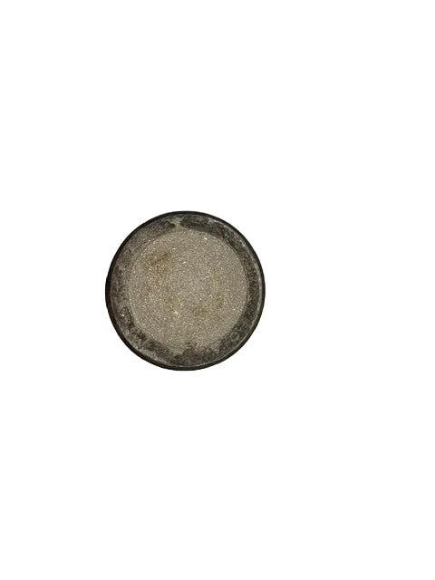 Top-down view of the handmade vase's unglazed sandy base with dark rim