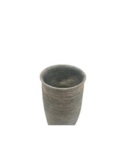 Black matte ribbed ceramic cup-form vessel, looking into the open mouth