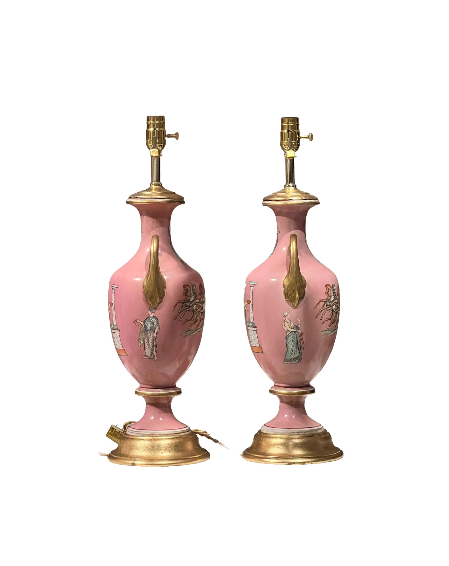 Side view of the pink urn lamp pair showing painted classical figures and gilt turned bases