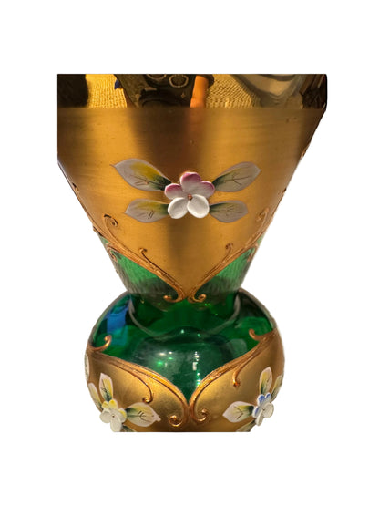 Close-up of the vase's upper body with raised pink and white enamel flowers and gilt scrollwork