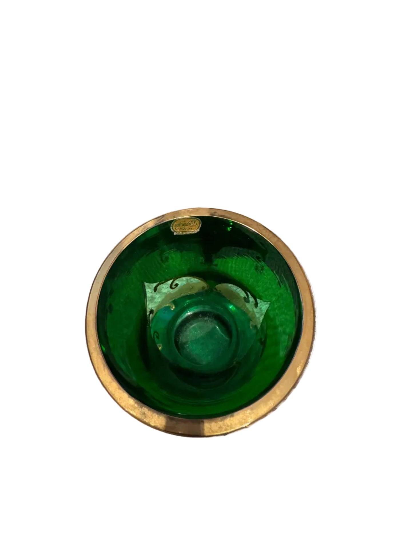 Top view into the emerald green vase showing gilt rim, green interior and a foil maker's label