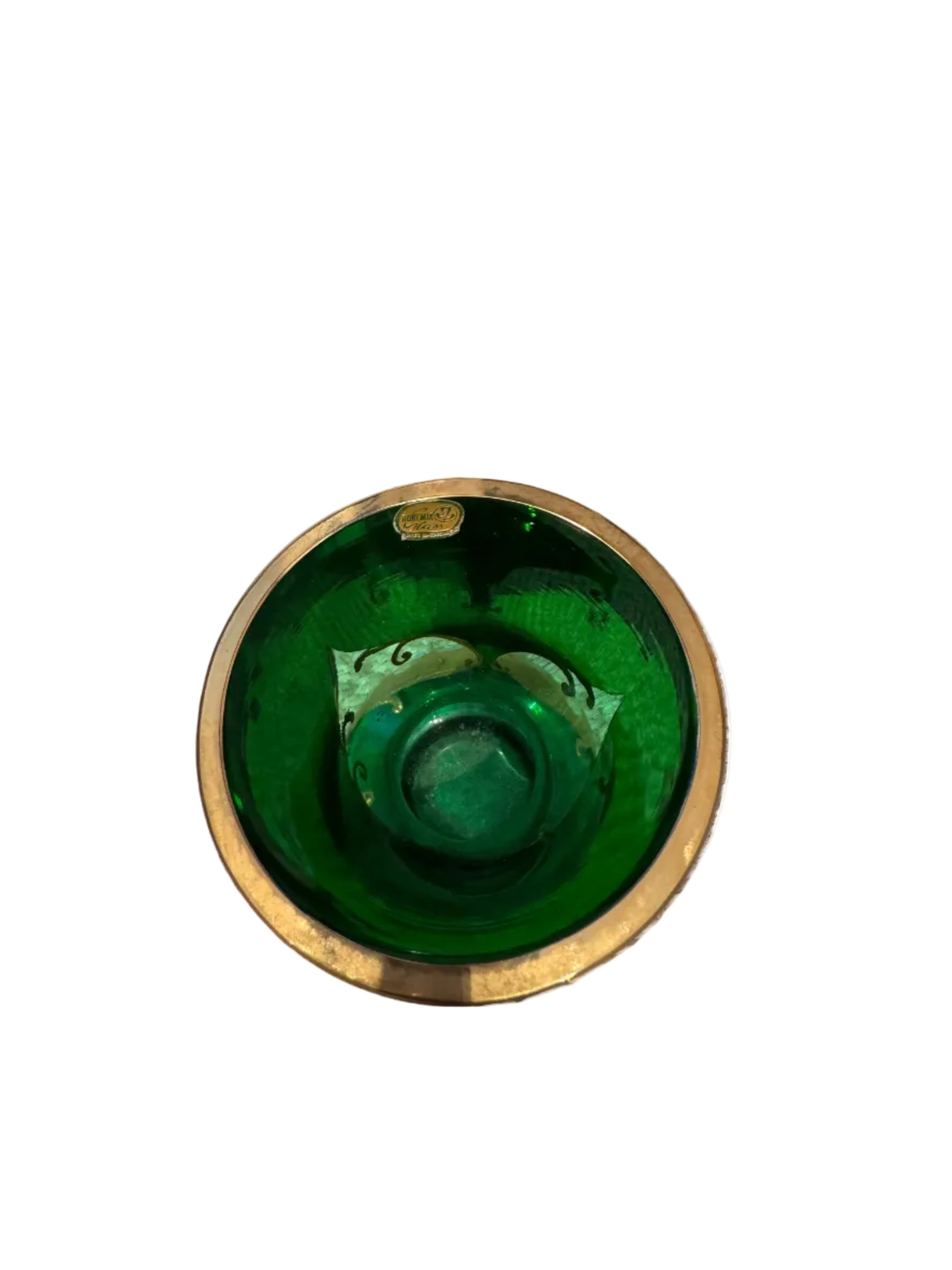 Top view into the emerald green vase showing gilt rim, green interior and a foil maker's label