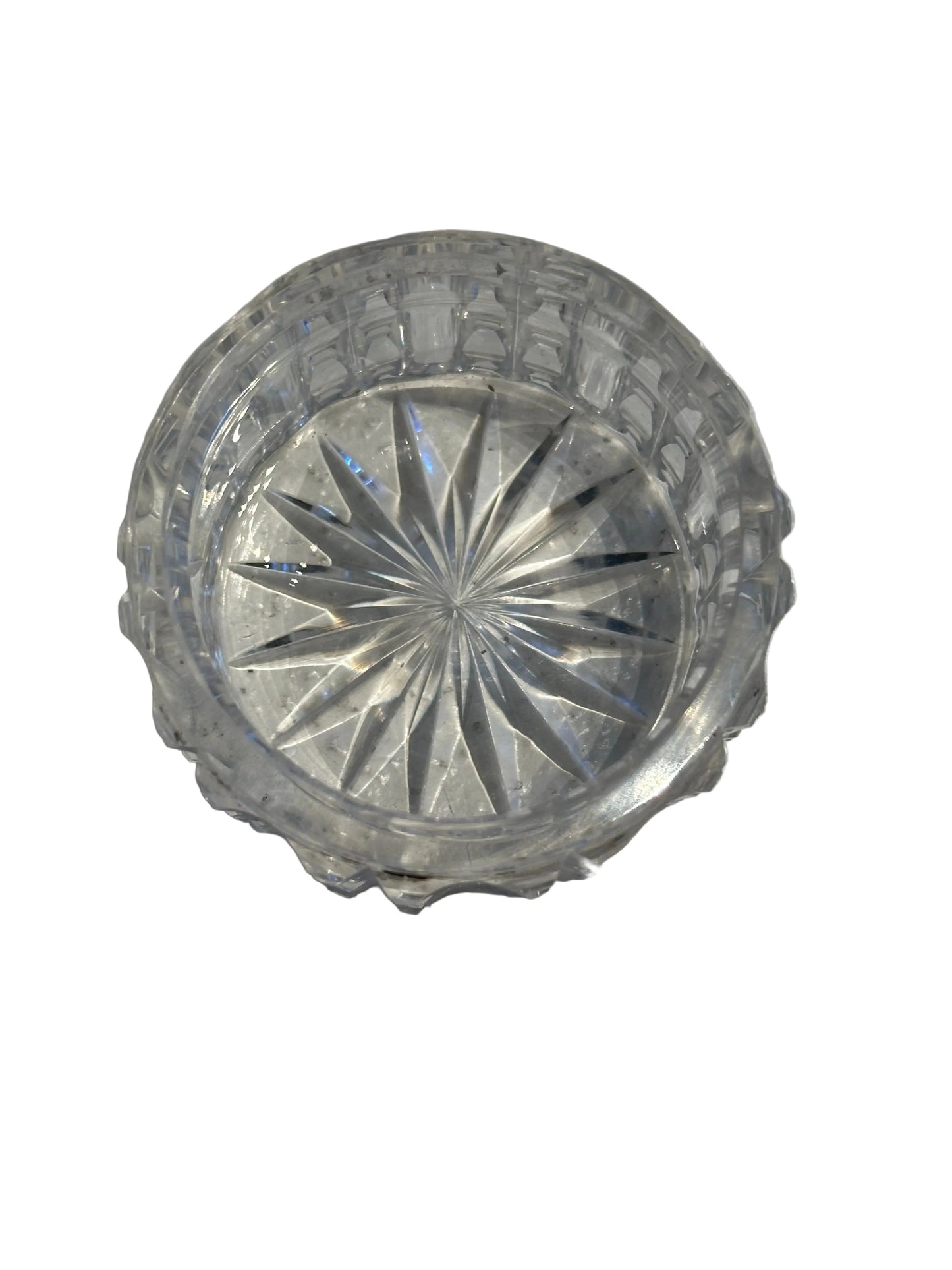 Vintage crystal and sterling petite dresser jar, top-down into the open jar with starburst-cut base.