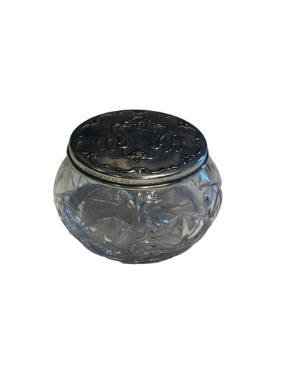 Gorham vintage crystal and silver dresser jar, closed view of the cut glass body and hallmarked silver lid.