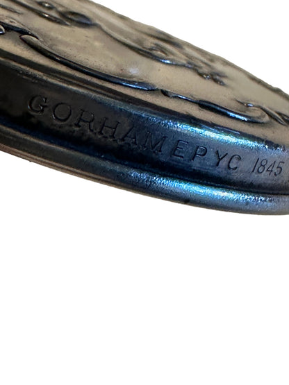 Close-up of the maker's mark engraved on the silver collar, reading Gorham EPYC 1845.