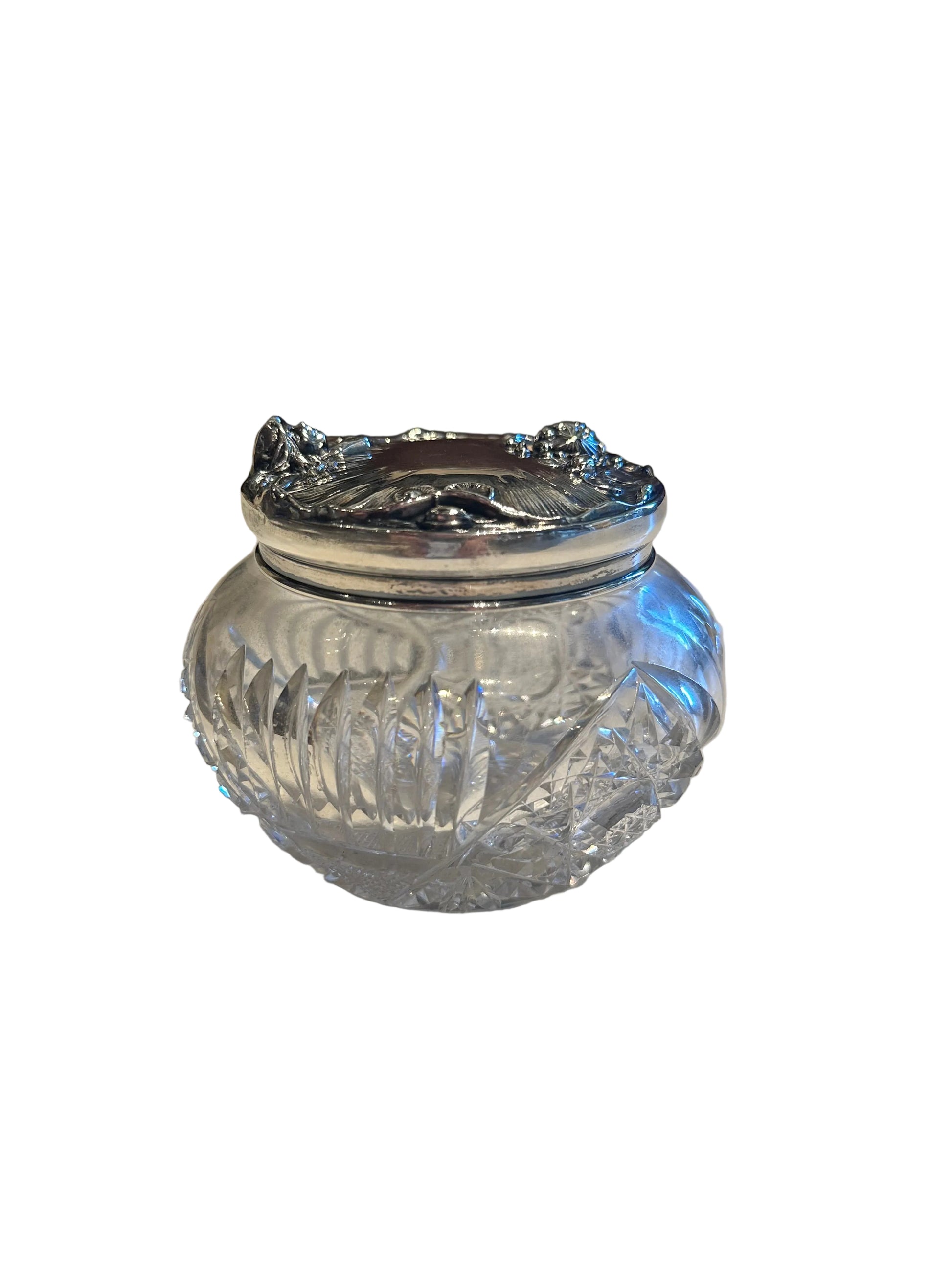 Antique cut-crystal dresser jar with Art Nouveau sterling silver lid, front view